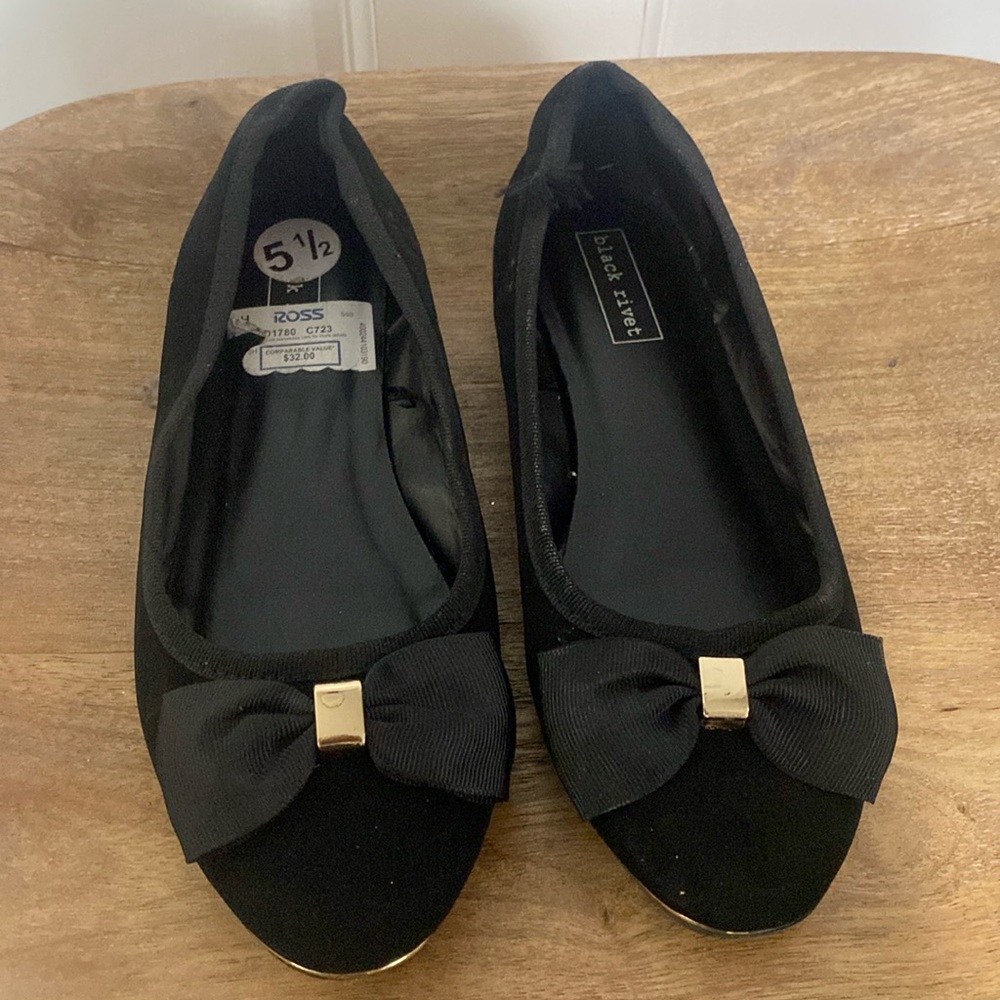 Black and gold ballet shoe